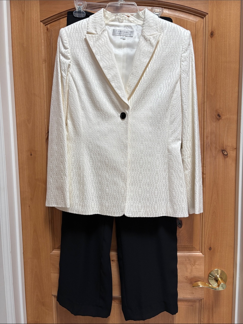 Tahari ASL Cream Textured Single-Button Blazer with black pants.